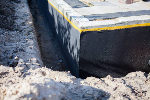Professional Waterproofing technician working in Unionville, IN